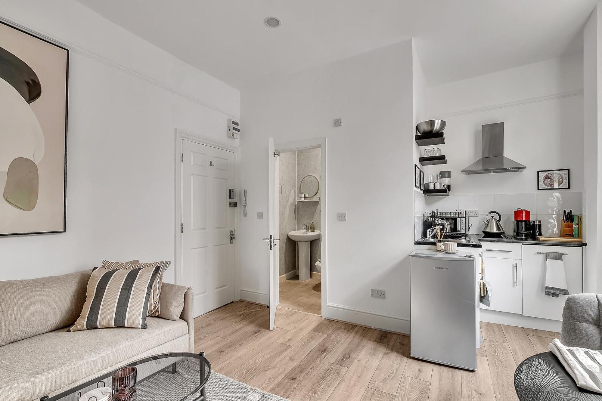 Lovely Kensington Apartments Лондон Номер фото